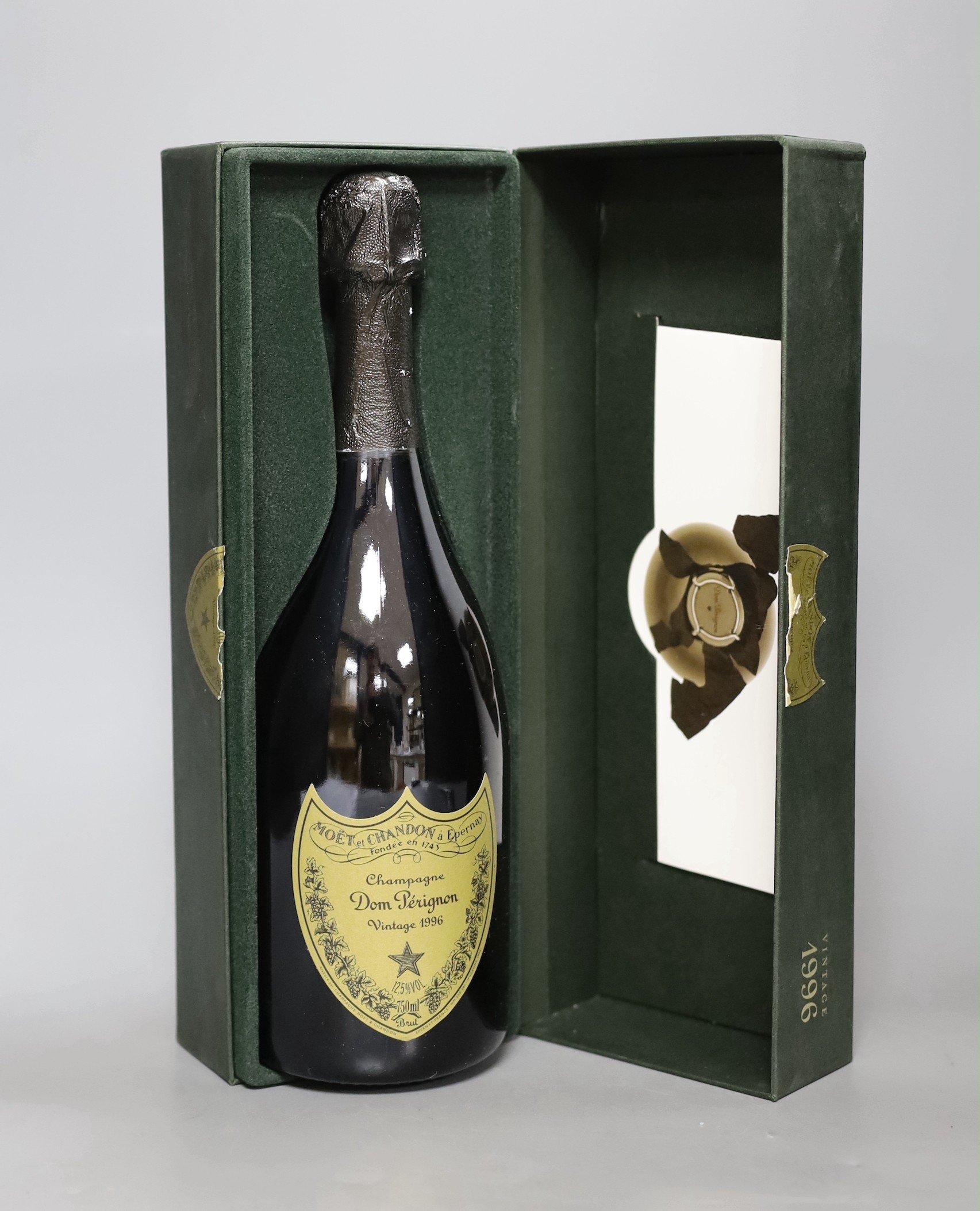 A cased bottle of Dom Perignon 1996 vintage Champagne.